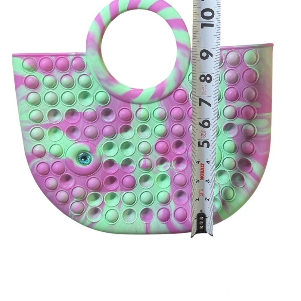 Ja-Ru Silicone Pop Fidget Tote Bag and‎ Bracelet Set Purple Green Swirl Eyeball